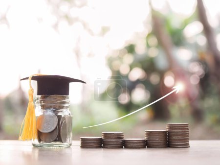 Glass bottle with graduation hat and Stack of coins with arrow rising icons. The concept of saving money for education, student loan, scholarship, tuition fees