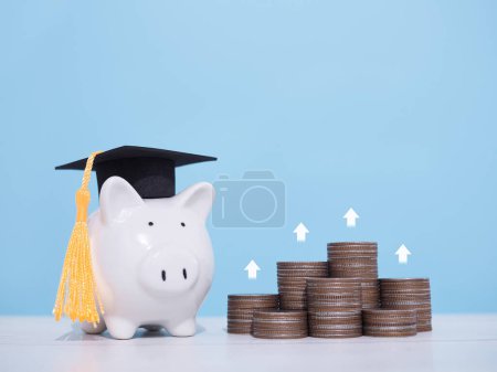 Piggy bank with graduation hat and stack of coins with arrow rising. The concept of saving money for education, student loan, scholarship, tuition fees in the future