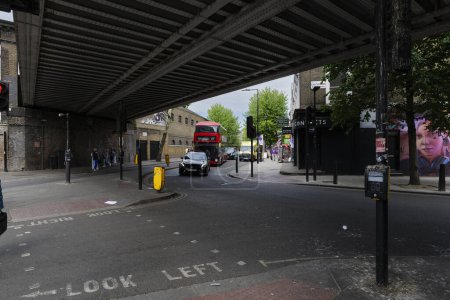 Photo for London - 03 06 2022: Crossroad under the Camden Lock bridge in Camden Town. - Royalty Free Image