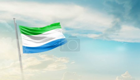 Téléchargez les photos : Sierra Leone waving flag in beautiful sky. - en image libre de droit