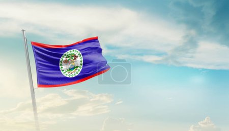Foto de Belice ondeando bandera en hermoso cielo. - Imagen libre de derechos