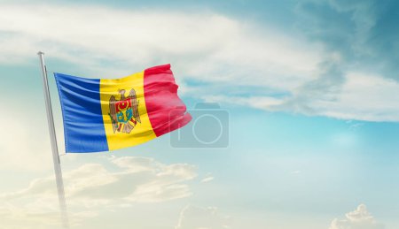 Foto de Moldova waving flag in beautiful sky. - Imagen libre de derechos