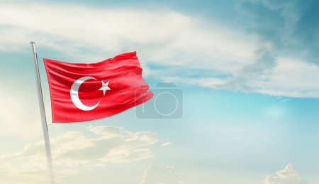 Turkey waving flag in beautiful sky.
