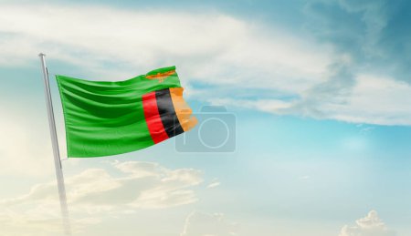Foto de Zambia waving flag in beautiful sky. - Imagen libre de derechos