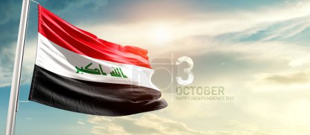 Photo for Iraq waving flag in beautiful sky with sun - Royalty Free Image