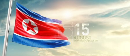 Foto de Corea del Norte ondeando bandera en hermoso cielo con sol - Imagen libre de derechos
