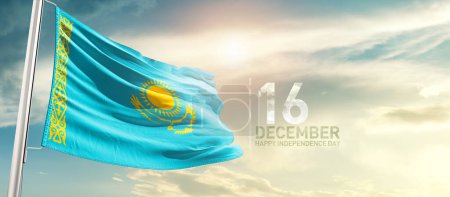 Foto de Kazajstán ondeando bandera en el hermoso cielo con sol - Imagen libre de derechos