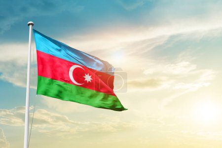Photo for Azerbaijan waving flag in beautiful sky with sun - Royalty Free Image