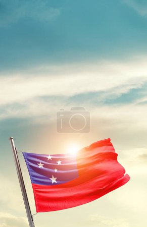 Foto de Samoa waving flag in beautiful sky with sun - Imagen libre de derechos