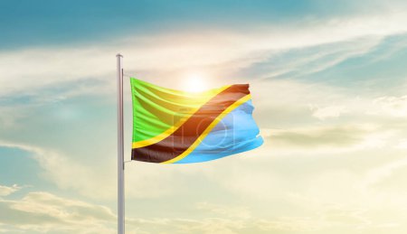 Foto de Tanzania waving flag in beautiful sky with sun - Imagen libre de derechos