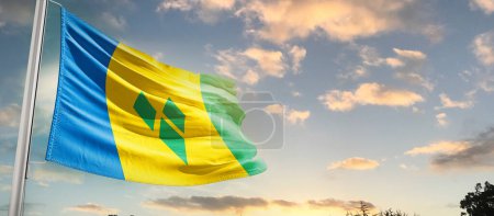 Photo for Saint Vincent and the Grenadines waving flag in beautiful sky with clouds - Royalty Free Image