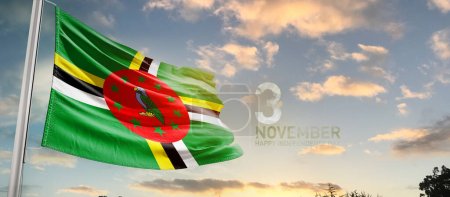 Foto de Dominica ondeando bandera en hermoso cielo con nubes - Imagen libre de derechos