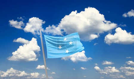 Photo for Micronesia waving flag in beautiful sky with clouds - Royalty Free Image