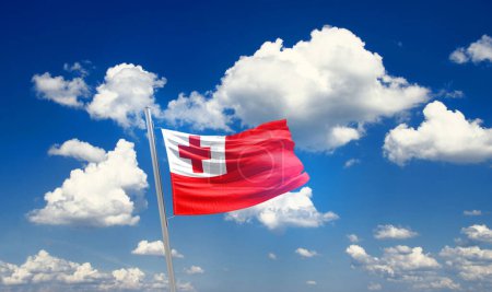 Foto de Tonga ondeando bandera en el hermoso cielo con nubes - Imagen libre de derechos