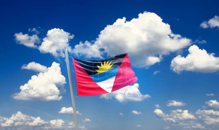 Photo for Antigua and Barbuda waving flag in beautiful sky with clouds - Royalty Free Image