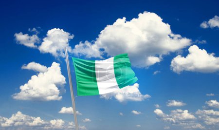 Photo for Nigeria waving flag in beautiful sky with clouds - Royalty Free Image