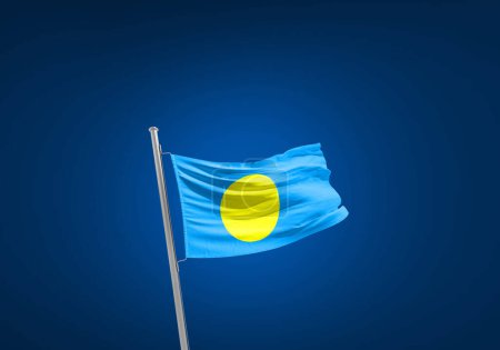 Foto de Bandera de Palau contra azul oscuro - Imagen libre de derechos