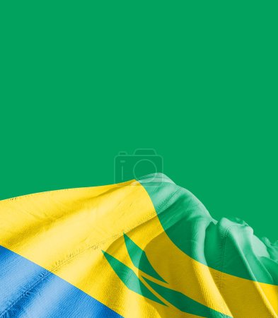 Foto de San Vicente y las Granadinas bandera contra verde - Imagen libre de derechos