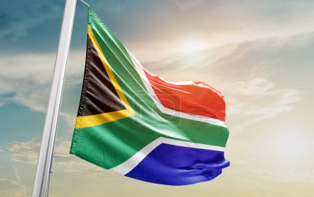 Téléchargez les photos : South Africa waving flag against sky - en image libre de droit