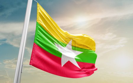 Foto de Myanmar waving flag against sky - Imagen libre de derechos