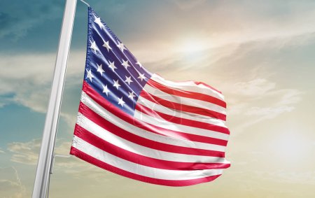 Téléchargez les photos : United States waving flag against sky - en image libre de droit