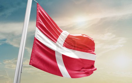 Foto de Denmark waving flag against sky - Imagen libre de derechos