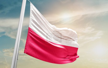 Foto de Poland waving flag against sky - Imagen libre de derechos