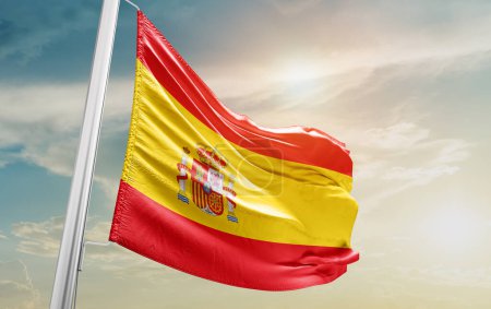 Foto de Spain waving flag against sky - Imagen libre de derechos