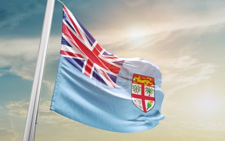 Foto de Fiyi ondeando bandera contra el cielo - Imagen libre de derechos