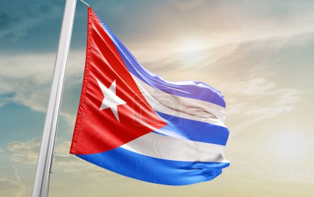 Téléchargez les photos : Cuba waving flag against sky - en image libre de droit