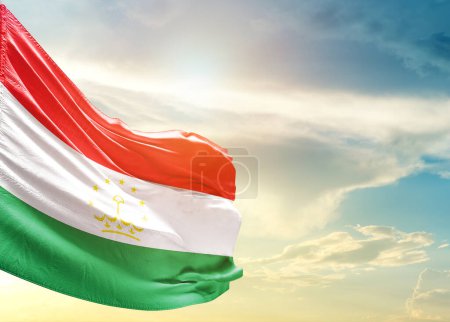 Photo for Tajikistan flag against sky - Royalty Free Image
