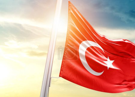 Photo for Turkey flag against sky with sun - Royalty Free Image
