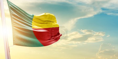 Photo for Benin flag against sky with clouds and sun - Royalty Free Image