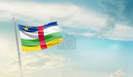 Central African Republic waving flag against blue sky with clouds