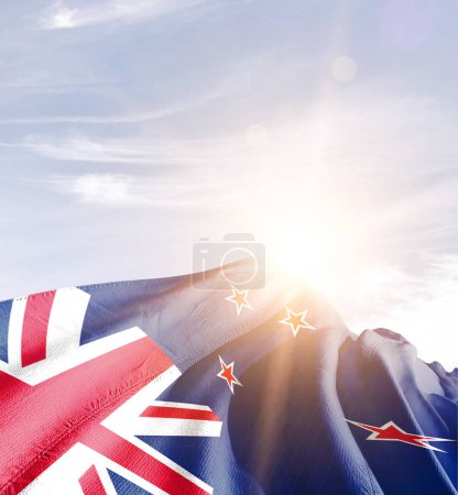 New Zealand waving flag in beautiful sky with sun