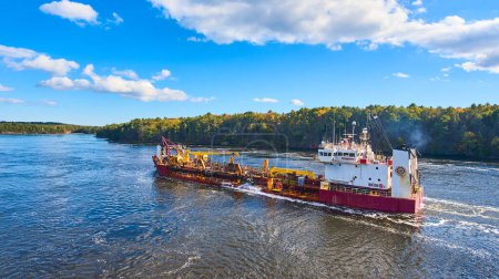 Photo for Image of Commercial ship from above sailing through river in Maine - Royalty Free Image