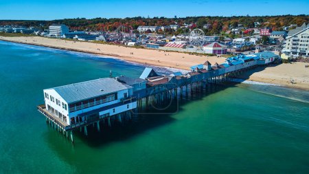 Photo for Image of Aerial of Old Orchard Beach pier in fall over Maine ocean and view of beach and town - Royalty Free Image