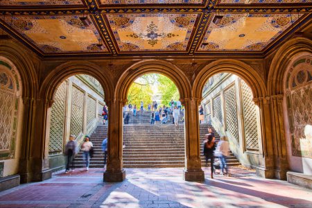 Photo for Image of People walking through Central Park stairs and limestone arches with murals on ceiling in New York City - Royalty Free Image