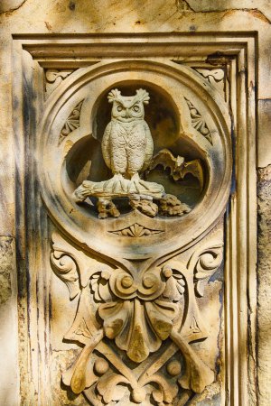 Photo for Image of Detail of owl and bat limestone sculpture in Central Park New York City - Royalty Free Image