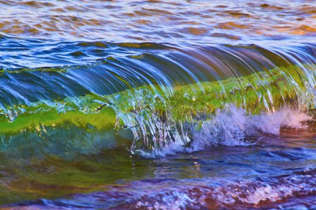 Photo for Image of Cresting wave with green and white within the water crashing against the shore - Royalty Free Image