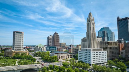 Photo for Image of Aerial blue skies over downtown Columbus Ohio with LeVeque Tower aerial - Royalty Free Image