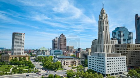 Photo for Image of Blue skies over downtown Columbus Ohio with LeVeque Tower aerial - Royalty Free Image