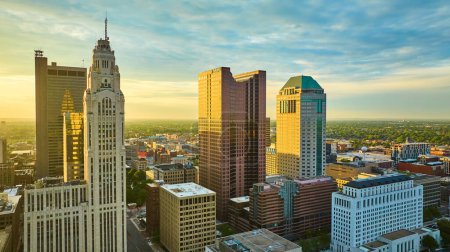 Photo for Image of Four main downtown Columbus Ohio skyscrapers aerial at sunrise with golden lighting - Royalty Free Image