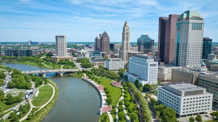 Photo for Image of Aerial downtown Columbus Ohio skyscrapers with Scioto River and green promenade and greenway - Royalty Free Image