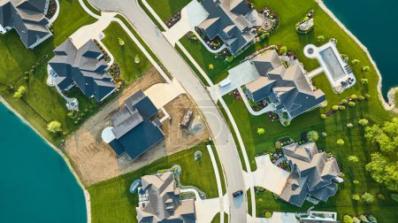 Photo for Image of Rich homes landscaping and construction of new home aerial - Royalty Free Image