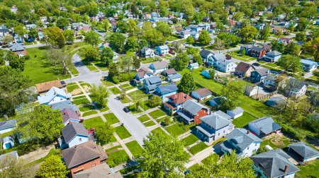 Image of Aerial houses city blocks neighborhood green summer lawns HOA asset