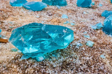 Photo for Image of Clear glass fragments with prism of turquoise and sky blue broken glass shards - Royalty Free Image