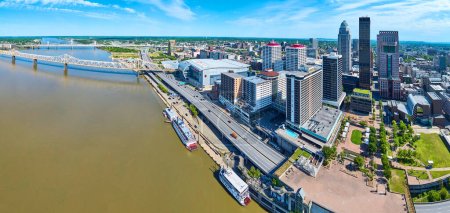 Image of Panorama Ohio River waterway riverboats and bridges leading to heart of downtown Louisville KY