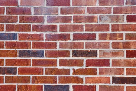 Photo for Image of Background asset red brick wall with varying hues and white mortar - Royalty Free Image