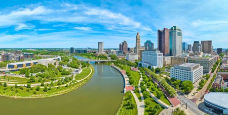 Photo for Image of Blue skies in summer over downtown Columbus Ohio aerial with both sides of river panorama - Royalty Free Image